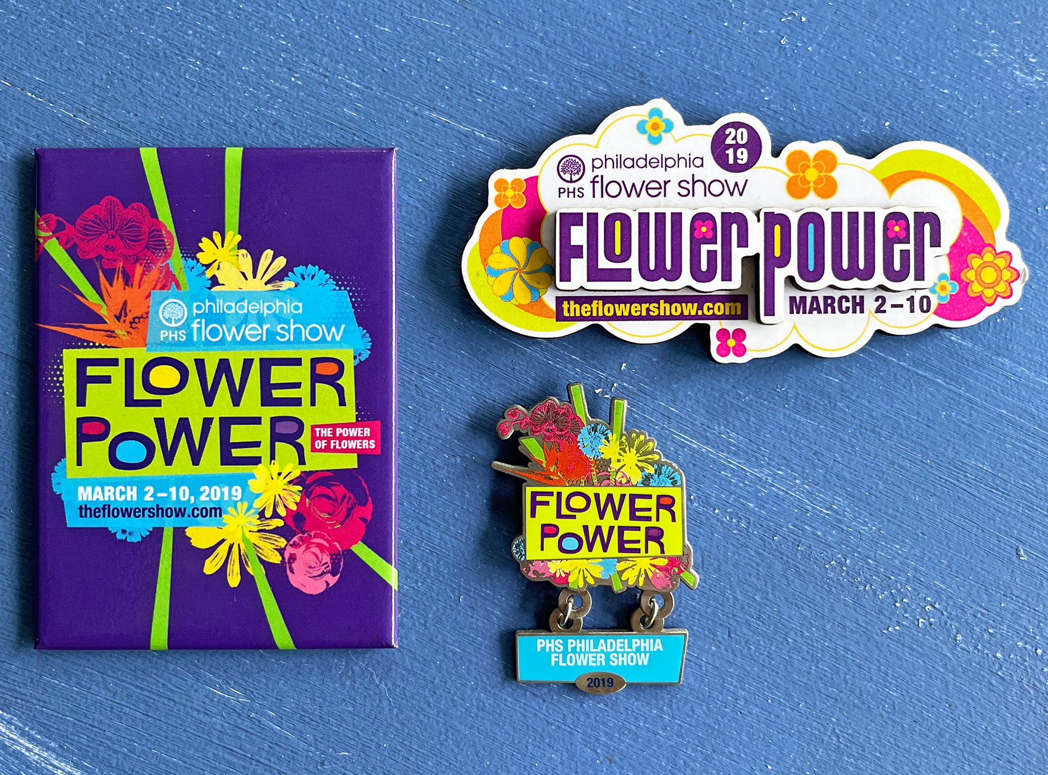 Magnets and pin for the 2019 PHS Philadelphia Flower Show.